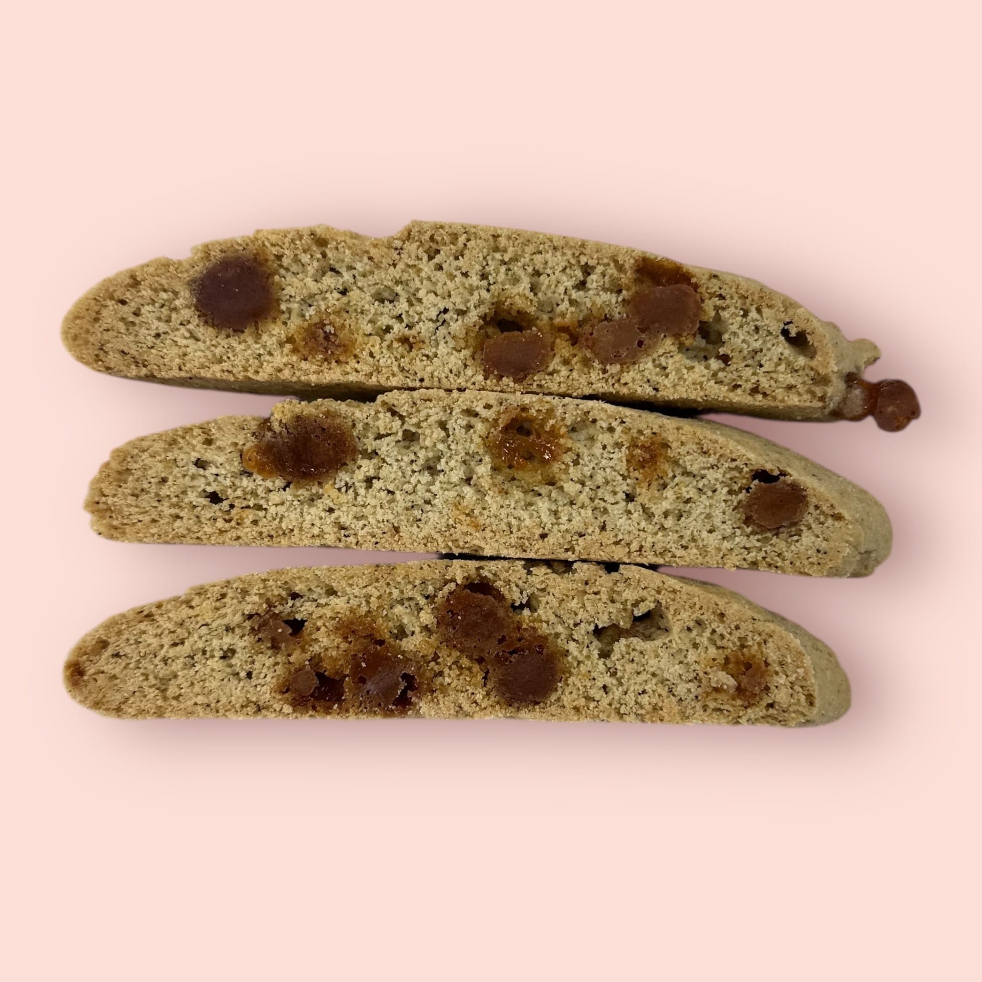 Gluten- Friendly biscotti stacked in three with a close up of it's caramel, and infused with coffee liqueur and espresso.